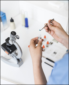 Microscope with specimen placed in vial